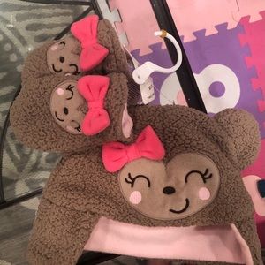 Bear with pink bow hat and matching mittens